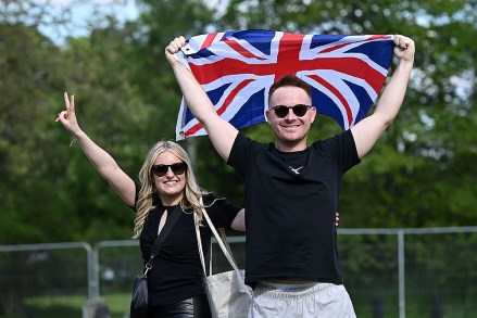 Members of the public pose for a photo as they arrive to take their seats inside Windsor Castle grounds ahead of the Coronation Concert, in Windsor, west of London on May 7, 2023. - For the first time ever, the East Terrace of Windsor Castle will host a spectacular live concert that will also be seen in over 100 countries around the world. The event will be attended by 20,000 members of the public from across the UK.
Coronation Concert at Windsor Castle, UK - 07 May 2023