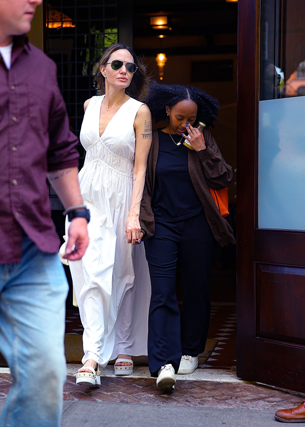 Angelina Jolie shows off new look as she visits her NY store