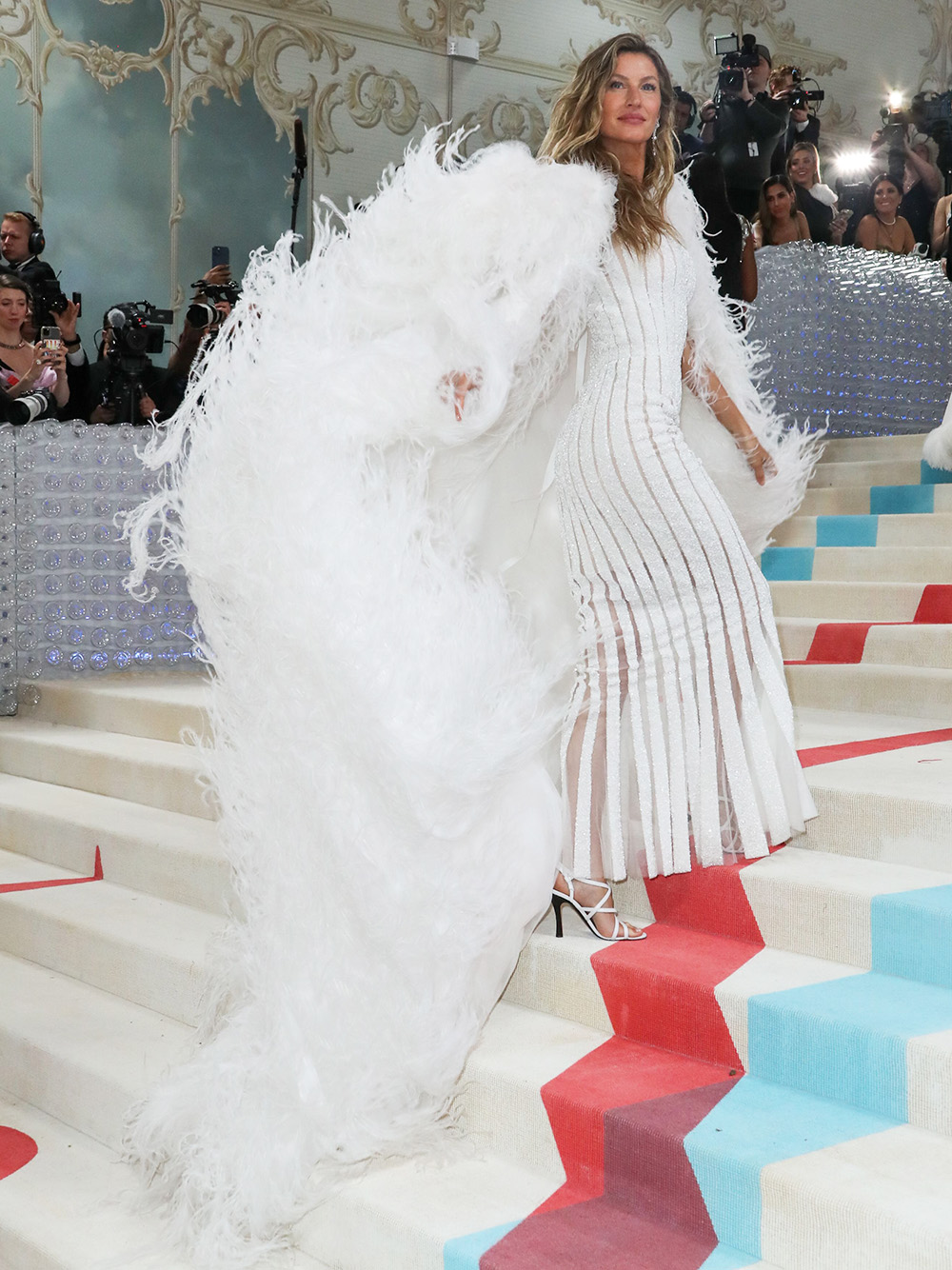 Aubrey Plaza Wears Sleek White Dress with Cutouts to 2023 Met Gala
