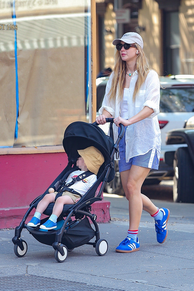 jennifer lawrence in blue shorts with son backgrid embed