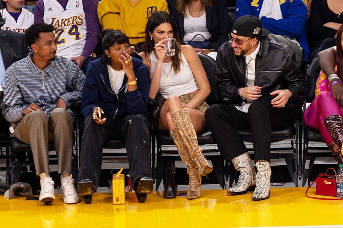 Kendall Jenner and Bad Bunny watch a game