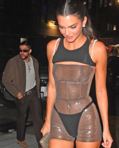 New York, NY  - Model Kendall Jenner leaves little to the imagination while heading to a private residence with her boyfriend Bad Bunny after the Met Gala in New York.

Pictured: Bad Bunny, Kendall Jenner

BACKGRID USA 1 MAY 2023 

BYLINE MUST READ: JosiahW / BACKGRID

USA: +1 310 798 9111 / usasales@backgrid.com

UK: +44 208 344 2007 / uksales@backgrid.com

*UK Clients - Pictures Containing Children
Please Pixelate Face Prior To Publication*