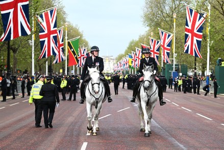 LONDON, ENGLAND - MAY 06: Mounted police officers can be seen on the Mall ahead of the Coronation of King Charles III and Queen Camilla on May 06, 2023 in London, England. The Coronation of Charles III and his wife, Camilla, as King and Queen of the United Kingdom of Great Britain and Northern Ireland, and the other Commonwealth realms takes place at Westminster Abbey today. Charles acceded to the throne on 8 September 2022, upon the death of his mother, Elizabeth II. (Photo by Charles McQuillan/Getty Images)
The Coronation of King Charles III, London, UK - 06 May 2023