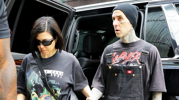 Kourtney Kardashian and Travis Barker looked very much in love while holding hands in NYC ahead of Blink-182’s concert