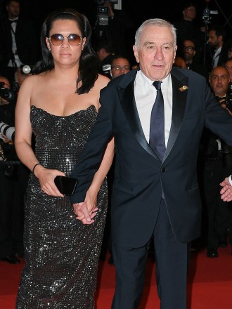 Martin Scorsese and Robert De Niro depart the "Killers Of The Flower Moon" red carpet during the 76th annual Cannes film festival. 20 May 2023 Pictured: Martin Scorsese Robert De Niro and Tiffany Chen. Photo credit: KCS Presse / MEGA TheMegaAgency.com +1 888 505 6342 (Mega Agency TagID: MEGA984533_046.jpg) [Photo via Mega Agency]