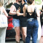 *EXCLUSIVE* Sam Smith packs on the PDA with boyfriend Christian Cowan during the Pride March in NYC
