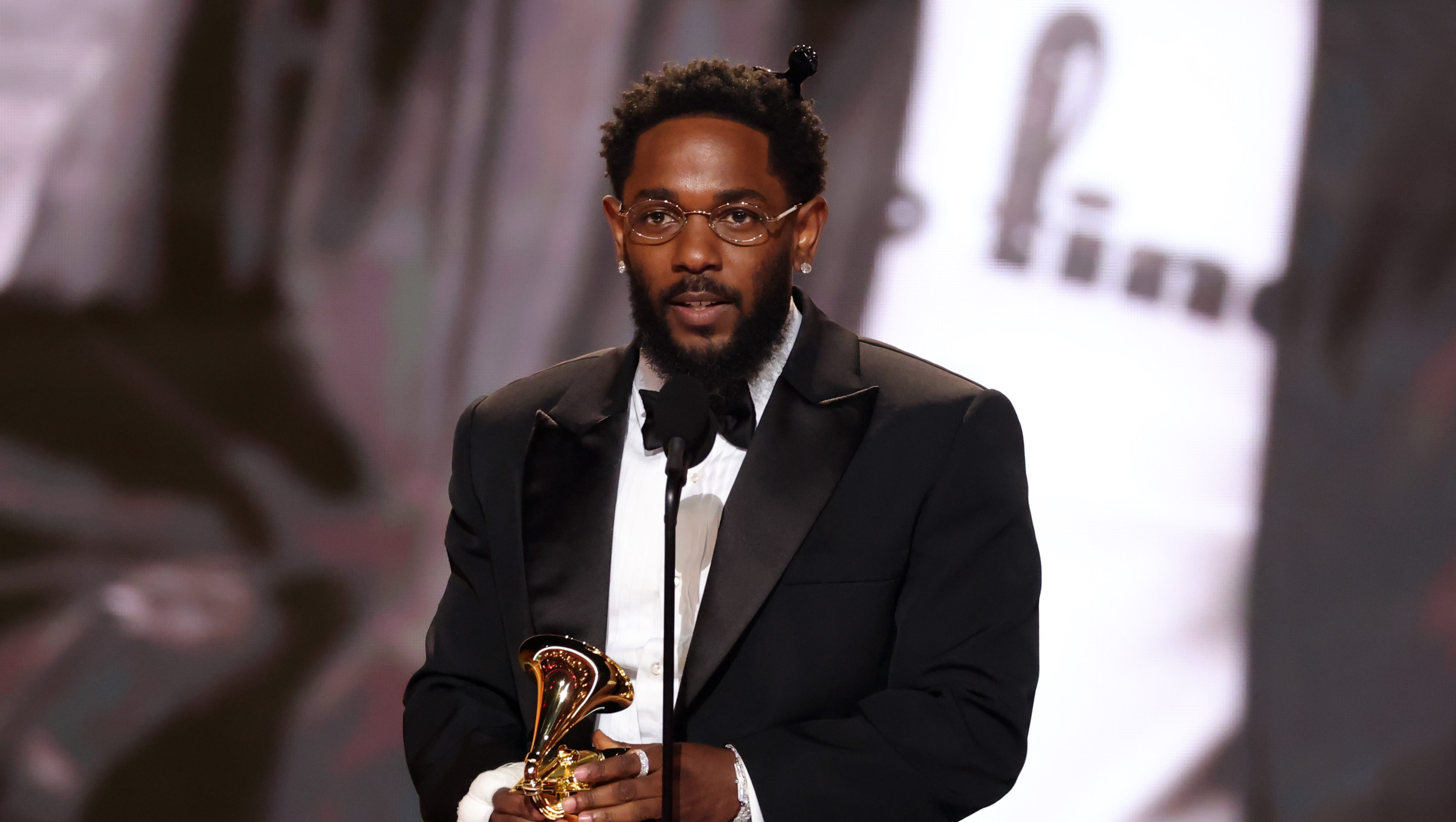 Kendrick Lamar Then & Now: See Photos of the Rapper in Concert & More Kendrick Lamar Then & Now: See Photos of the Rapper in Concert & More