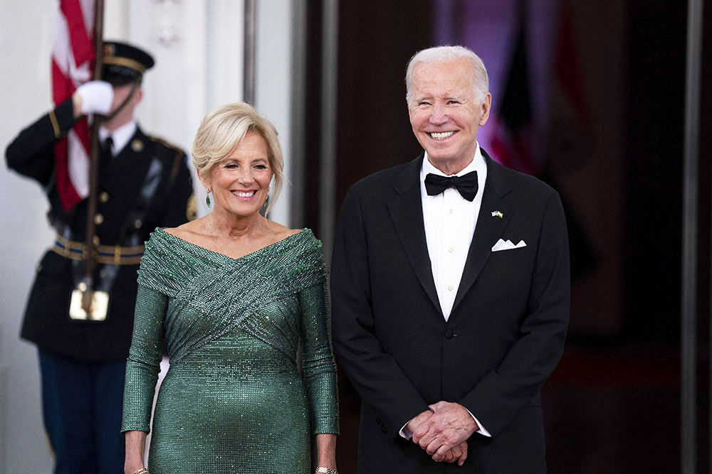 US President Joe Biden, First Lady Jill Biden and Narendra Modi, India's prime minister, during an arrival on the North Portico of the White House ahead of a state dinner in Washington, DC, US, on Thursday, June 22, 2023. Biden and Modi announced a series of defense and commercial deals designed to improve military and economic ties between their nations during a state visit today. Credit: Sarah Silbiger / Pool via CNP. 22 Jun 2023 Pictured: US President Joe Biden, right, and First Lady Jill Biden wait to greet Indian Prime Minister Narendra Modi, not pictured, during an arrival on the North Portico of the White House ahead of a state dinner in Washington, DC, US, on Thursday, June 22, 2023. Biden and Modi announced a series of defense and commercial deals designed to improve military and economic ties between their nations during a state visit today. Credit: Al Drago / Pool via CNP. Photo credit: Sarah Silbiger - Pool via CNP / MEGA TheMegaAgency.com +1 888 505 6342 (Mega Agency TagID: MEGA998886_001.jpg) [Photo via Mega Agency]