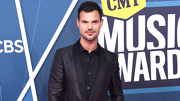 Taylor Lautner Shows Off His Bulging Bicep After Haters Say He ‘Aged Like A Raisin’: Photo