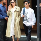 *EXCLUSIVE* Angelina Jolie and her son Pax are all smiles and wave as they check out of their hotel this afternoon in Soho
