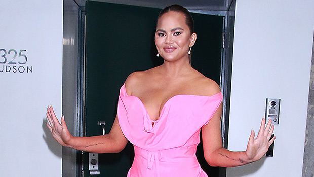 Chrissy Teigen Claps Back After Hater Says Her ‘New Face’ Is Due To ‘Overfill’: ‘I Gained Weight’