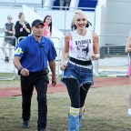 EXCLUSIVE: Gwen Stefani  surprises fans as she  runs across the field after her performance to watch Pink