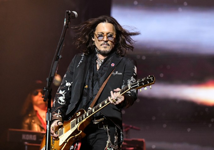 Johnny Depp performing in concert