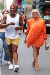 Jane Krakowski and Titus Burgess ride the Audible bus in the 2023 Pride March in New York City. Jane is wearing a frilly bright orange dress with Valentino rockstud high heels and colorful bag.

Pictured: Jane Krakowski,Titus Burgess
Ref: SPL8523432 250623 NON-EXCLUSIVE
Picture by: Christopher Peterson / SplashNews.com

Splash News and Pictures
USA: 310-525-5808
UK: 020 8126 1009
eamteam@shutterstock.com

World Rights