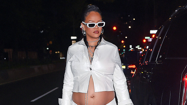 Read more about the article Rihanna Shows Baby Bump in Silver Crop Top & Brushes Sparkles On it – Hollywood Life