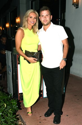 EXCLUSIVE: Chase Chrisley and fiancé Emmy Medders are seen leaving trendy upscale eatery Papi Steak after having dinner in Miami. The couple seems in good spirits as they laughed and kissed before taking off in red Rolls Royce. 24 Feb 2023 Pictured: Chase Chrisley; Emmy Medders. Photo credit: MEGA TheMegaAgency.com +1 888 505 6342 (Mega Agency TagID: MEGA947130_008.jpg) [Photo via Mega Agency]