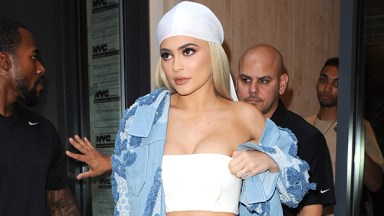 Kylie Jenner nude crop top lip gloss photo