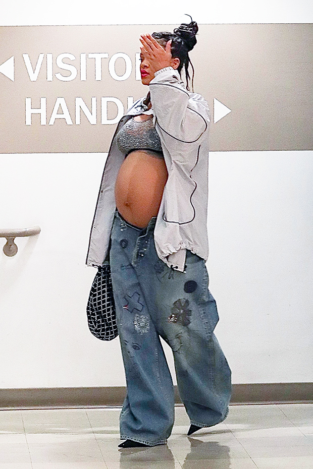 Rihanna sparkly bra and jeans in LA