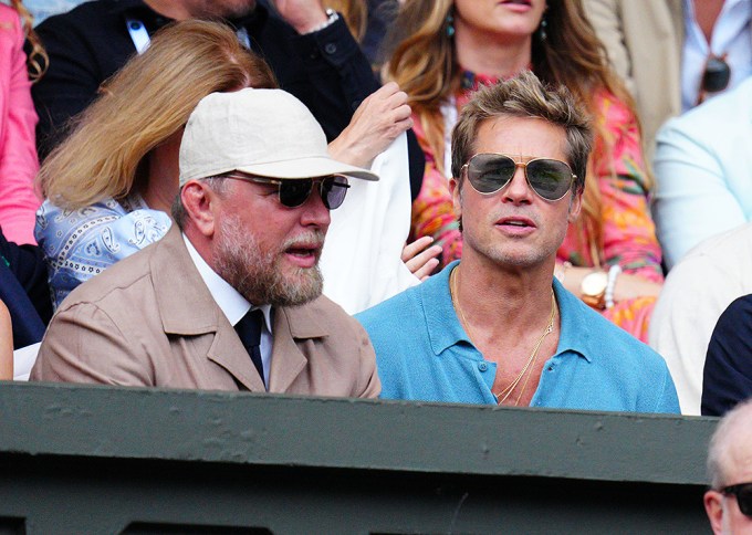Guy Richie & Brad Pitt sitting
