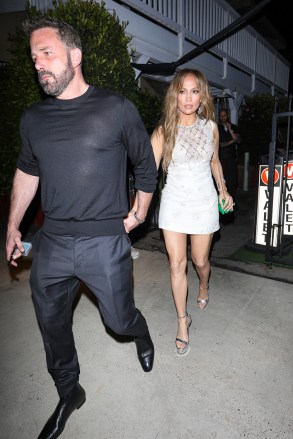 Santa Monica, CA  - *EXCLUSIVE*  - Jennifer Lopez and Ben Affleck encounter a humorous moment on their anniversary night at Giorgio Baldi, struggling to open the door of their cutting-edge new vehicle as they bid farewell.Pictured: Jennifer Lopez, Ben AffleckBACKGRID USA 16 JULY 2023 USA: +1 310 798 9111 / usasales@backgrid.comUK: +44 208 344 2007 / uksales@backgrid.com*UK Clients - Pictures Containing ChildrenPlease Pixelate Face Prior To Publication*