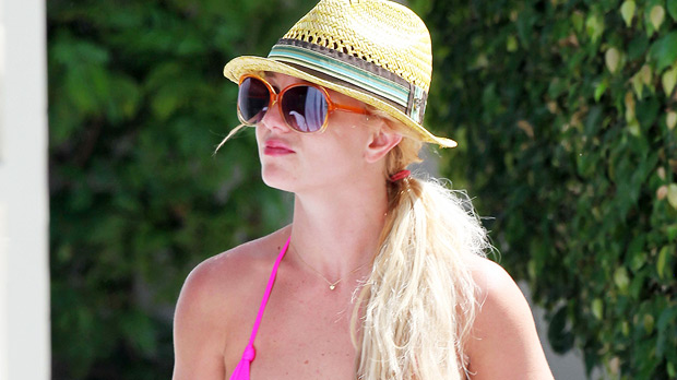 Britney Spears Rocks Neon Pink Bikini Bottoms & Dances To Santana In New Video: Watch