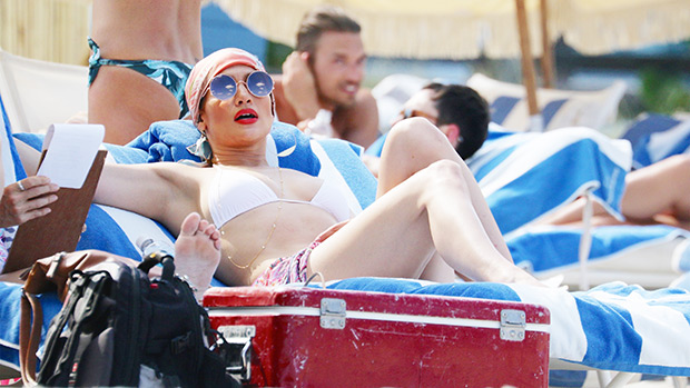 Jennifer Lopez, 53, Stuns In Plunging Swimsuit While Poolside On Fourth Of July: Photos