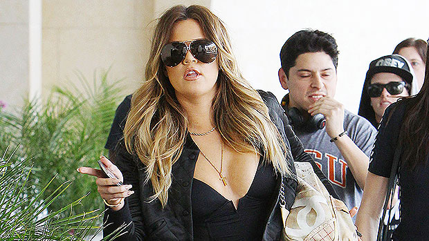 Khloe Kardashian Turns Heads In Daisy Dukes & A Leather Blazer With Nothing Underneath