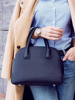 woman holding a purse