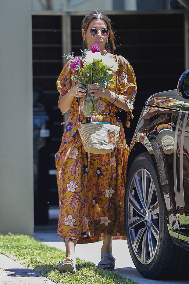 Sandra Bullock Looks So Fabulous in a Floral Dress and Basket Bag