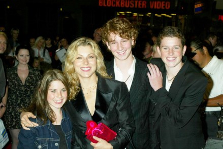 Tatum O'Neal, Her Children Kevin, Sean, Emily
30th Anniversary 'Paper Moon' Reunion and Screening
August 21, 2003 - Los Angeles, CA. 
Tatum O'Neal with her children Kevin, Sean and Emily.
30th Anniversary Reunion Screening and Handprint Ceremony Of Peter Bogdonovich's Film Paper Moon held at the Vista Theatre.
Photo®Jim Smeal/BEImages