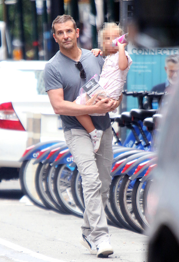 Bradley Cooper with daughter, Lea, at the fair in Paris