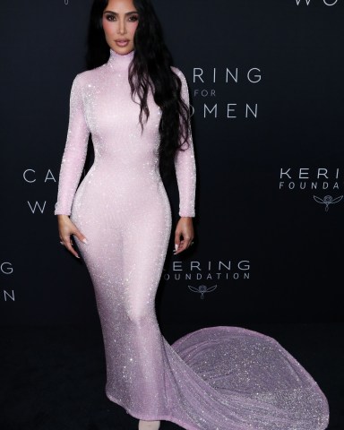 Kim Kardashian looks pretty in pink as she steps out in lacy see-through  bodysuit - Mirror Online