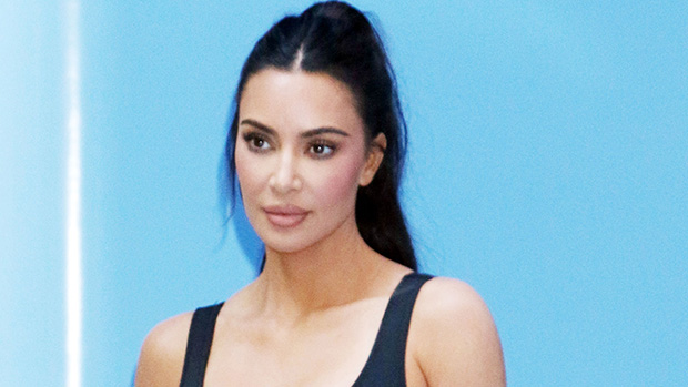 Kim Kardashian’s Cropped Turtleneck Is Perfect For Fall & You Can Shop A Similar Top Under $30