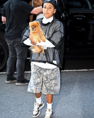 NEW YORK, NEW YORK - AUGUST 14: Kim Kardashian and North West are seen in Midtown Manhattan on August 14, 2024 in New York City. (Photo by James Devaney/GC Images)