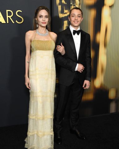 HOLLYWOOD, CALIFORNIA - NOVEMBER 17: Angelina Jolie and Knox Jolie-Pitt arrives at the 2024 Governors Awards at Dolby Theatre on November 17, 2024 in Hollywood, California.  (Photo by Steve Granitz/FilmMagic)