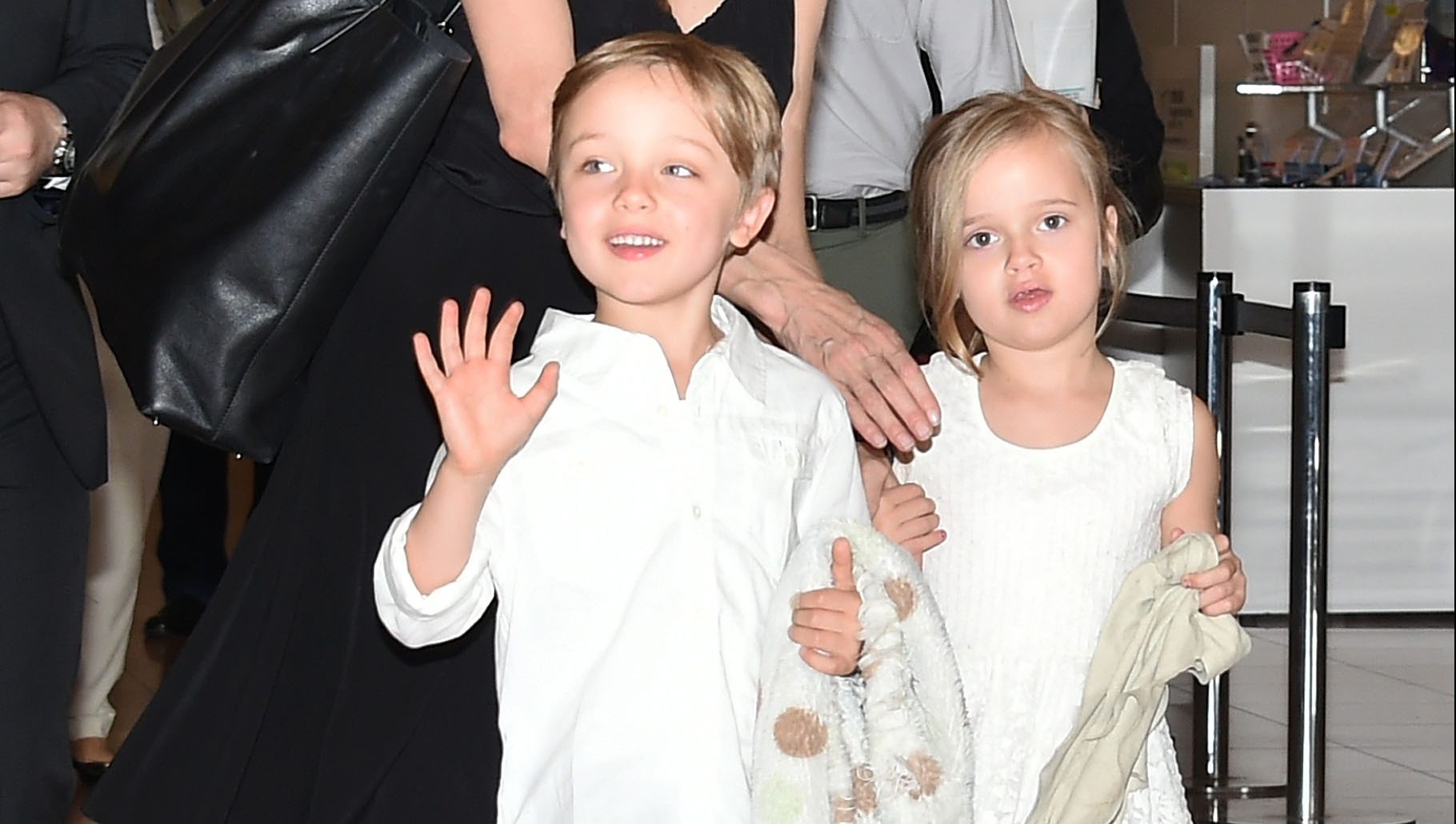 TOKYO, JAPAN - JUNE 21:  Knox Jolie-Pitt, Angelina Jolie and Vivienne Jolie-Pitt are seen upon arrival at Haneda Airport on June 21, 2014 in Tokyo, Japan. (Photo by Jun Sato/GC Images)