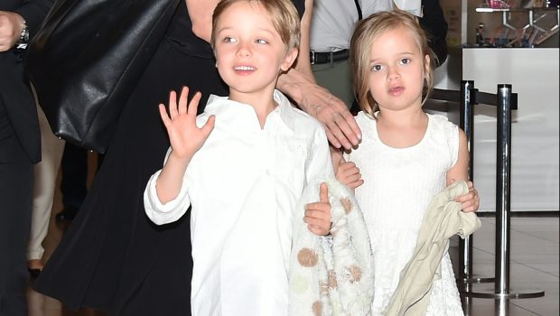 TOKYO, JAPAN - JUNE 21:  Knox Jolie-Pitt, Angelina Jolie and Vivienne Jolie-Pitt are seen upon arrival at Haneda Airport on June 21, 2014 in Tokyo, Japan. (Photo by Jun Sato/GC Images)