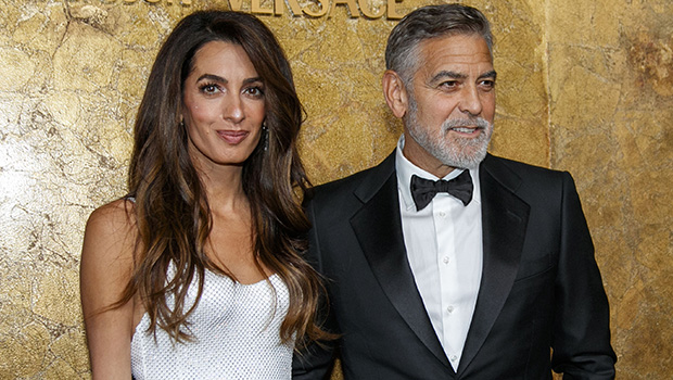 George Clooney’s Wife Amal Radiates in Elegant White Versace Gown: See the Photos