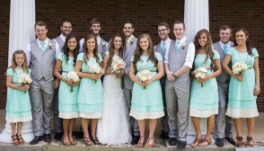 Duggar family posing at Jill Duggar and Derick Dillard's wedding