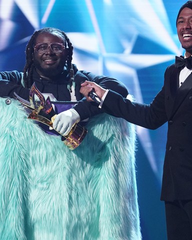 THE MASKED SINGER: L-R: T-Pain and host Nick Cannon in the special two-hour “Road to the Finals / Season Finale: The Final Mask is Lifted” season finale episode of THE MASKED SINGER airing Wednesday, Feb. 27 (8:00-10:00 PM ET/PT) on FOX. © 2019 FOX Broadcasting. CR: Michael Becker / FOX.