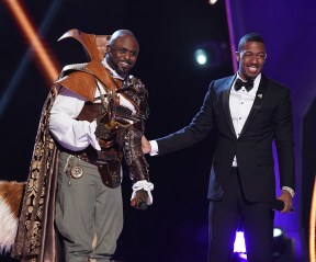 THE MASKED SINGER: Wayne Brady and host Nick Cannon in the “Road to the Finals / Season Finale: And The Winner Takes It All and Takes It Off” two-hour season finale episode of THE MASKED SINGER airing Wednesday, Dec. 18 (8:00-10:00 PM ET/PT) on FOX. CR: Lisa Rose / FOX ©2020 FOX MEDIA LLC.