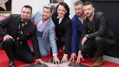 NSYNC members pose on the Hollywood Walk of Fame