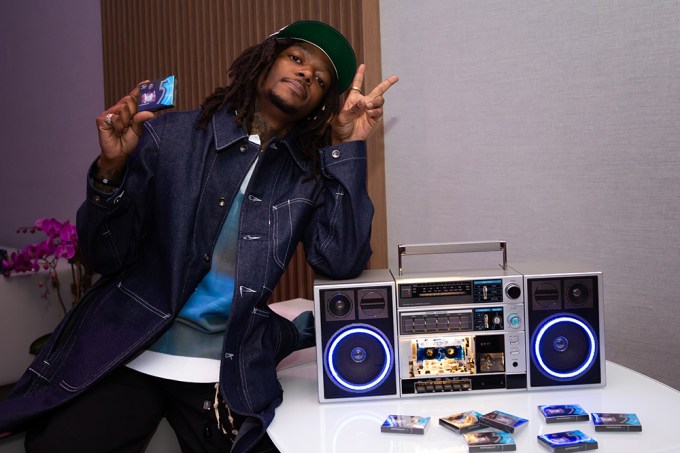 J.I.D. Poses Next to Custom-Made “5 in a Lifetime” Boombox