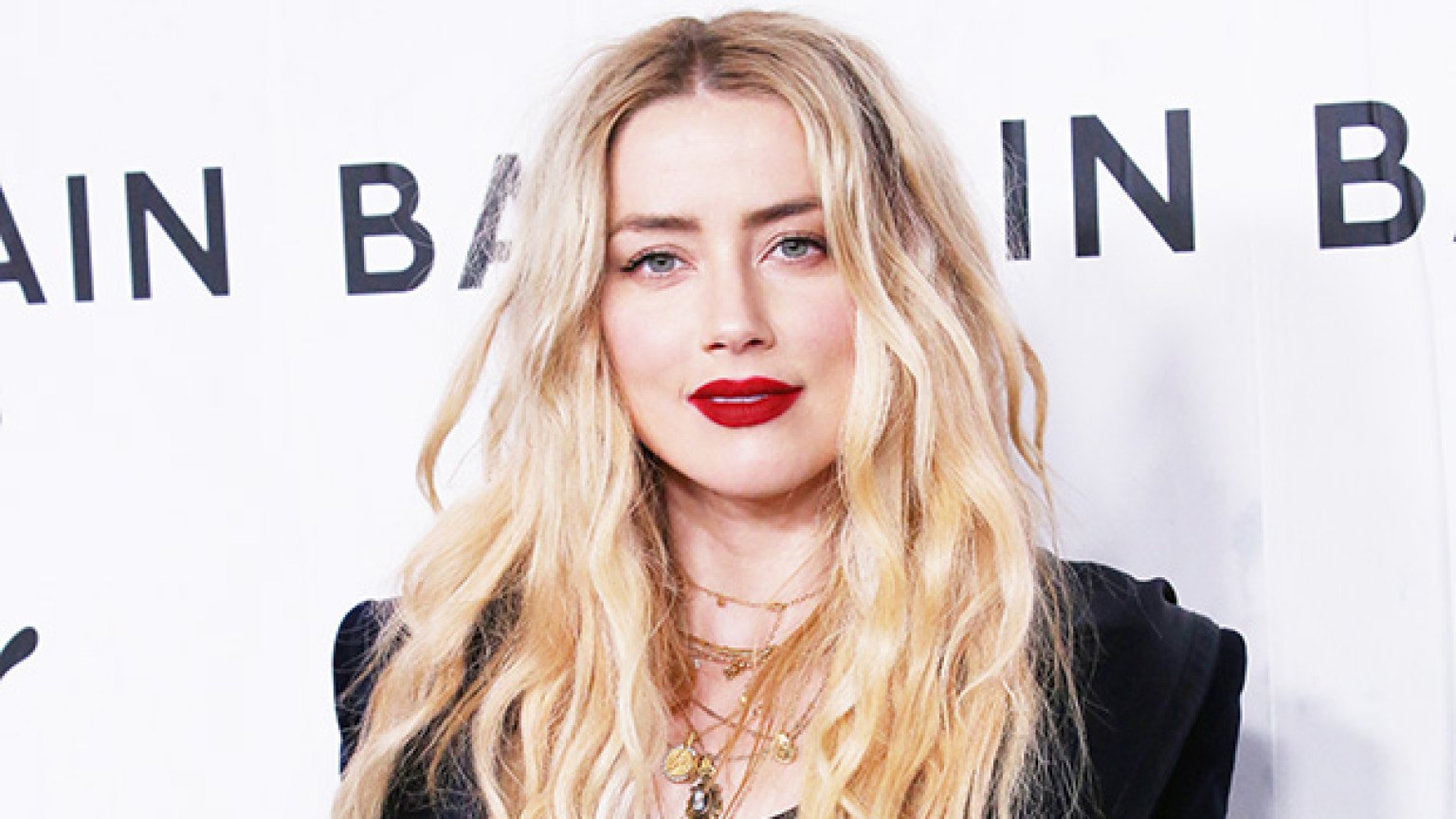 Amber Heard Holds Hands With Daughter Oonagh in Madrid: Photos ...