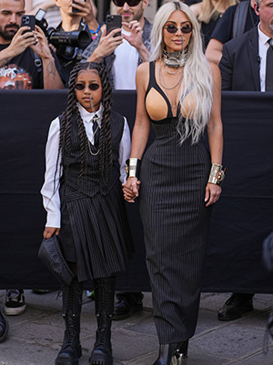 North West and Kim Kardashian during Paris Fashion Week 2022