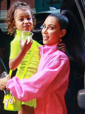 North West Channels Y2K Kim Kardashian in Purple Tracksuit: Photos