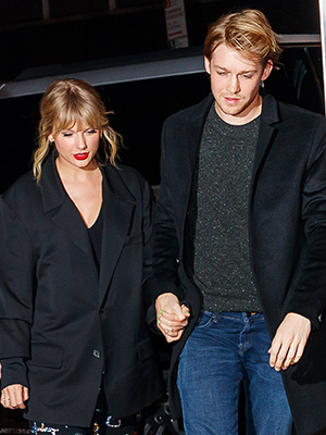Taylor Swift and Joe Alwyn holding hands