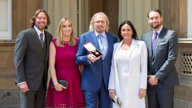 Barry Gibb and his wife, Linda, and their children