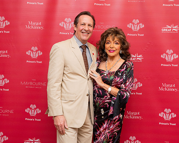 joan collins floral dress dbe luncheon embed The Times Of Update