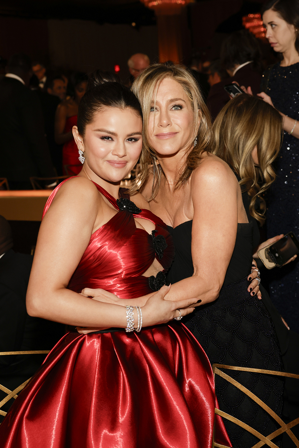 Selena Gomez and Jennifer Aniston at the 81st Annual Golden Globe Awards, airing live from the Beverly Hilton in Beverly Hills, California on Sunday, January 7, 2024, at 8 PM ET/5 PM PT, on CBS and streaming on Paramount+. Photo: Francis Specker/CBS ©2024 CBS Broadcasting, Inc. All Rights Reserved.